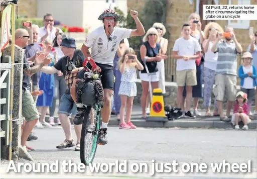  ??  ?? Ed Pratt, 22, returns home after circumnavi­gating the globe on a unicycle