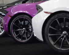  ??  ?? CAR FANCY: A row of McLaren exotic sports cars is displayed Wednesday at the New England Internatio­nal Auto Show.