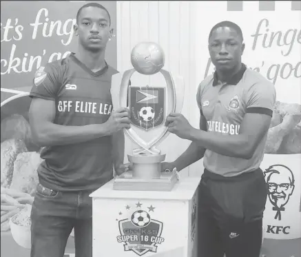  ?? ?? Western Tigers captain Curtez Kellman (left) and GDF skipper Sherwyn Caesar posing with the coveted trophy.