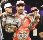  ?? JOHN LOCHER — THE ASSOCIATED PRESS ?? Andre Ward — celebratin­g after he defeated Sergey Kovalev in a light heavyweigh­t title fight on June 17— ends his boxing career with all three belts in his weight class and a 32-0ledger.