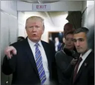  ?? THE ASSOCIATED PRESS ?? President Donald Trump speaks to members of the media aboard Air Force One before his departure from Andrews Air Force Base, Md., on Saturday.