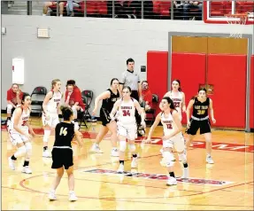  ?? MARK HUMPHREY ENTERPRISE-LEADER ?? Prairie Grove junior Trinity Dobbs gets open for a 3-pointer against Farmington. The Lady Tigers dropped a pair of games in early January, losing 74-43 at Farmington on Tuesday, Jan. 5 and 69-33 at Pea Ridge on Friday, Jan. 8.