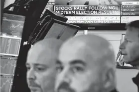  ?? Richard Drew / Associated Press ?? Technology and health care stocks were broadly higher Wednesday on Wall Street as results of the midterm elections came in as investors had expected.