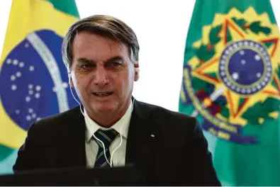  ?? Marcos Corrêa/PR ?? Na terça (26), Bolsonaro publicou uma MP autorizand­o reajuste para policiais civis, militares e bombeiros do Distrito Federal. O custo para a União é estimado em R$ 500 milhões
