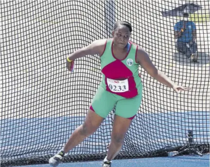  ?? (Photo: Dwayne Richards) ?? Oberlin High School’s Shatoya Chambers in her gold medal-winning performanc­e with the discus during Eastern Athletics Championsh­ips at National Stadium in Kingston on Tuesday.