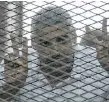  ?? KHALED DESOUKI/ AFP/GETTY IMAGES ?? Mohamed Fadel Fahmy was convicted in a Cairo court Monday and sentenced to seven years.