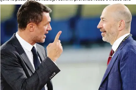  ?? BARTOLETTI ?? Il dt rossonero Paolo Maldini, 51 anni, discute con l’ad Ivan Gazidis, 55 anni