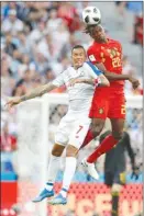  ?? The Associated Press ?? Panama’s Blas Perez, left, and Belgium’s Dedryck Boyata jump for the ball during a Group G match on Monday.