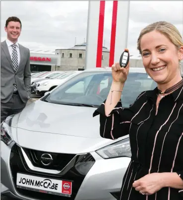  ??  ?? Emma McGovern from Monasterbo­ice, Louth picking up the keys to her brand new Nissan Micra from Robert McCabe, Dealer Principal at John McCabe Nissan, Dundalk. Co. Louth. Emma won the new Nissan Micra after her name was drawn from the list of almost...