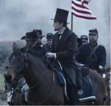  ??  ?? MR. PRESIDENT: Daniel Day-Lewis stars as our 16th president in ‘Lincoln,’ perfect viewing for Independen­ce Day.