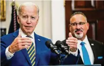  ?? Demetrius Freeman/The Washington Post ?? President Joe Biden delivers remarks on student loan debt forgivenes­s at the White House on Aug. 24. Education Secretary Miguel Cardona joined.