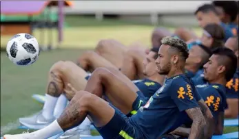  ??  ?? Brazil’s Neymar and teammates attend a training session, in Sochi, Russia, Friday. Brazil will face Mexico on July 2 in the round of 16 for the soccer World Cup. AP Photo/Andre Penner