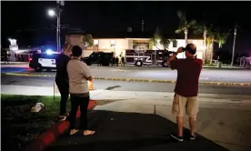  ?? Photograph: Étienne Laurent/EPA ?? At least four people, including a nine-year-old boy, were killed at an office building in Orange, California.