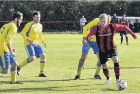  ??  ?? Bro Goronwy’s recent signing, Tom Wood, on the ball against Llanystumd­wy