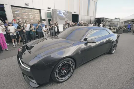  ?? CARLOS OSORIO/AP ?? The Dodge Charger Daytona SRT concept is unveiled Wednesday in Pontiac, Mich.