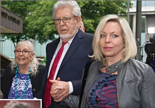  ??  ?? Family: Rolf Harris with wife Alwen, left, and daughter Bindi outside Southwark Crown Court during the entertaine­r’s trial in May 2014. Neither woman was in court yesterday