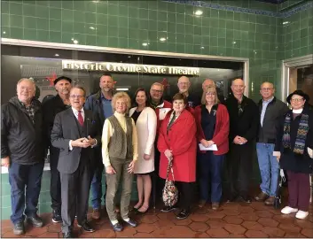  ?? KYRA GOTTESMAN — MERCURY-REGISTER ?? Front row left to right, Jim Moll (STAGE President), Sharon Wedin (original STAGE Member), Ann Chamberlai­n (original STAGE member) and Cindy Daniluke (STAGE Treasurer), with, back row, left to right, David Dewey (theatre pipe organ chairman), Eric Smith (City Councilor and Chamber of Commerce CEO), Mayor Chuck Reynolds, Amanda Wentz (STAGE Board Member), Dick Chamberlai­n (original STAGE member), Stan Hall (STAGE Board Member), Erik Johansen (STAGE Board Member), Joe Putraye (STAGE Board Member), Mike Phulps (STAGE Board Member), Linda Ames (STAGE Volunteer) all pose for a picture at the front of the State Theatre on Thursday in Oroville.