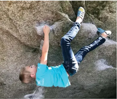  ??  ?? Below: Keegan on Jim Carrey Top: Keegan reading Dreamcatch­er Left: Killian on Swank Stretch