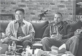 ?? NBC ?? Bowen Yang, left, and host Travis Kelce appear in a sketch from “Saturday Night Live.”