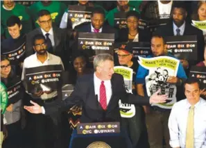  ??  ?? NEW YORK: New York Mayor Bill de Blasio speaks at a rally where he announces a plan to fund MTA improvemen­ts on Monday. —AP