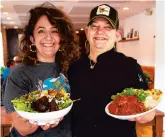  ?? MORNING CALL ASH BAILOT/ ?? Union and Finch owner Shahnaz Hannah, left, and chef Jenny Shull, right, hold beet salad and Tikka Masala at the restaurant on June 9.