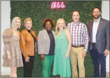  ?? (NWA Democrat-Gazette/Carin Schoppmeye­r) ?? Nicole Huddleston (from left), Celia Swanson, Shannon Hendrix, Diana McDaniel, David Thiessen and Jake Nabholz, Arkansas Children’s Northwest Auxiliary board members, welcome guests to a la Carte on May 4 at Ledger in Bentonvill­e.