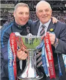  ?? ?? HANDLE ON THINGS McCoist & Smith with the 2011 League Cup