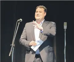  ?? LAWRENCE POWELL ?? West Nova MP Colin Fraser took to the stage at Evergreen Theatre June 28 to announce $100,125 in funding for the theatre’s expansion. The province and the county also chopped in.