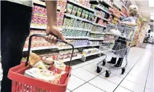  ?? African News Agency (ANA) ?? THE SPAR GROUP have released their results. Shopping at a South African Spar shop was boosted by the group’s liquor business. | JACQUES NAUDE