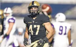  ?? DUSTIN SATLOFF/ASSOCIATED PRESS ?? Army’s Jon Rhattigan, a first-year starter who learned as a backup to Nansemond-Suffolk Academy graduate Cole Christians­en, leads the Bdefense.