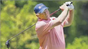  ?? Lori Van Buren / times union ?? John durcan hits a tee shot at Pinehaven Country Club on monday. He finished second in the Legends division at the NENYPGA event.