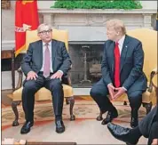  ?? Saul Loeb AFP/Getty Images ?? “WE MADE a deal today,” said European Union leader Jean-Claude Juncker, with President Trump.