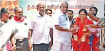  ?? ?? CPM state secretary K Balakrishn­an seeking support for DMK’s Chennai South candidate and sitting MP Thamizhach­i Thangapand­ian on Friday