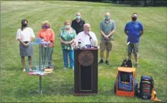  ?? PHOTO PROVIDED ?? Troy Mayor Patrick Madden speaks during the ribbon-cutting for a new disc golf course in Troy.