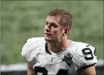  ?? THE ASSOCIATED PRESS FILE ?? In this Nov. 29, 2020, file photo, Las Vegas Raiders defensive end Carl Nassib leaves the field after a game against the Falcons in Atlanta. On Monday, Nassib became the first active NFL player to come out as gay, announcing it on Instagram.