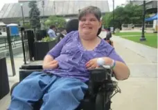  ?? ETHAN LOU/TORONTO STAR ?? Michelle Gifford rode her electric wheelchair for more than 2.6 kilometres to get to Mel Lastman Square for Canada Day celebratio­ns.