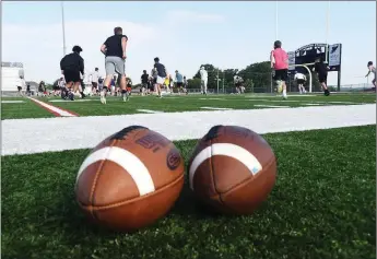  ?? NWA Democrat-Gazette photograph by Flip Putthoff ?? Players on the Pea Ridge Blackhawks team are back in practice in Blackhawk Stadium.