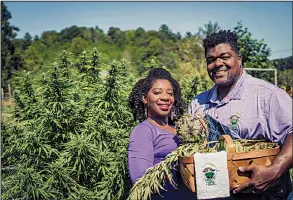  ?? AP/Green Heffa Farms Inc./DONALD REX BISHOP ?? Clarenda Stanley-Anderson and her husband, Malcolm Anderson Sr., own a hemp-farming business in Liberty, N.C., and are optimistic about the crop’s future.