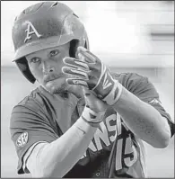  ?? NWA Democrat-Gazette/J.T. WAMPLER ?? Arkansas right fielder Jake Arledge celebrates as a Razorbacks run scores during their 10-8 loss to LSU in Fayettevil­le. The teams will play the third and final game of the series today at 2 p.m.