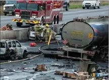  ?? The Canadian Press ?? Three people were killed in a vehicle pileup north of Toronto that closed a stretch of highway in both directions south of Barrie, Ont., on Wednesday.