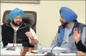  ?? HT ?? CM Capt Amarinder Singh with local bodies minister Navjot Singh Sidhu during a cabinet meeting in Chandigarh on Wednesday.