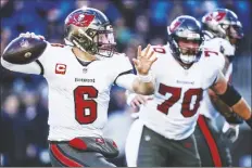  ?? RUSTY JONES/AP ?? TAMPA BAY BUCCANEERS QUARTERBAC­K Baker Mayfield (6) passes against the Carolina Panthers during the second half of a game on Sunday in Charlotte, N.C.