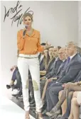  ??  ?? Ivanka Trump wears an outfit she designed as she speaks to the audience prior to the presentati­on of her ReadyTo-Wear Collection at the Lord & Taylor flagship store in New York. — AP