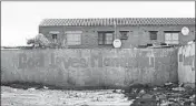  ??  ?? Graffiti adorns a wall in Manenberg. A preacher recruited rival gangs to distribute food during the lockdown.