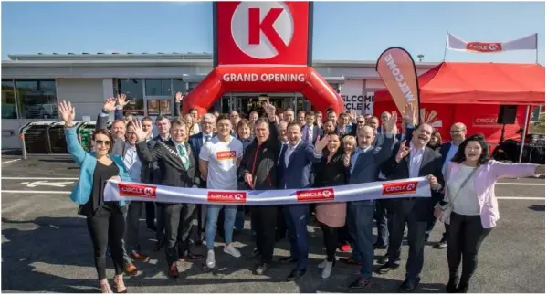  ??  ?? Wexford GAA star Lee Chin cutting the ribbon at the opening of the Circle K service station at Ballyellen.