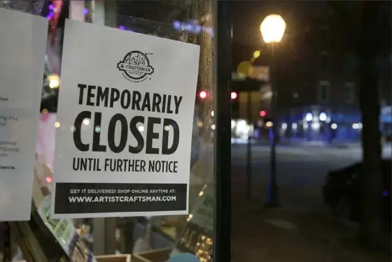  ?? Elizabeth Robertson/The Philadelph­ia Inquirer ?? A sign hangs in the window of the Artist and Craftsman Supply in Philadelph­ia on March 19. Pennsylvan­ia’s unemployme­nt rose in July to remain well above the national rate, even as payrolls rebounded for another month from pandemic-driven shutdowns, the state reported Friday.