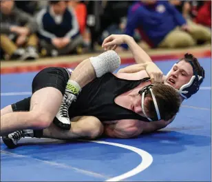  ?? Photos by Jerry Silberman / risportsph­oto.com ?? Burrillvil­le junior Nick Goselin (above, top) finished fifth in the 152-pound weight class, while Central/Falls/Tolman/Shea co-op 106-pounder Jacob Felix (right) also finished fifth after a frustratin­g consolatio­n semifinal defeat to Ponaganset’s Tim Cook Saturday night at the PCTA.