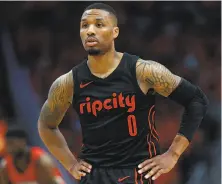  ?? Sean Gardner / Getty Images ?? Trail Blazers guard Damian Lillard has been hounded by the Pelicans, who lead the Western Conference series 3-0.