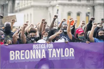  ?? DARRON CUMMINGS — THE ASSOCIATED PRESS ?? Black Lives Matter protesters march, Friday, Sept. 25, 2020, in Louisville.