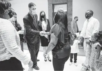  ?? Photos by Elizabeth Conley / Staff photograph­er ?? Families that were wrongly accused of child abuse by CPS wait in the hallway before the Texas House Human Services committee hosts a hearing for HB3820.